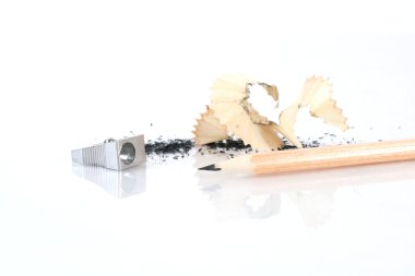 Sharpened pencil and wood shavings clipart