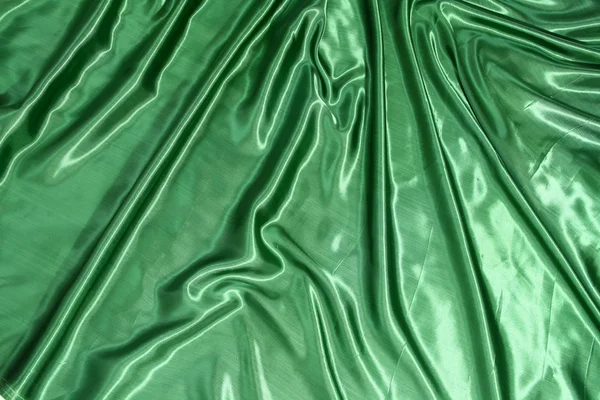 Гладкий элегантный зелёный шелк — стоковое фото