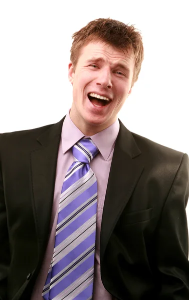 Lachende jonge zakenman geïsoleerd op een witte achtergrond — Stockfoto