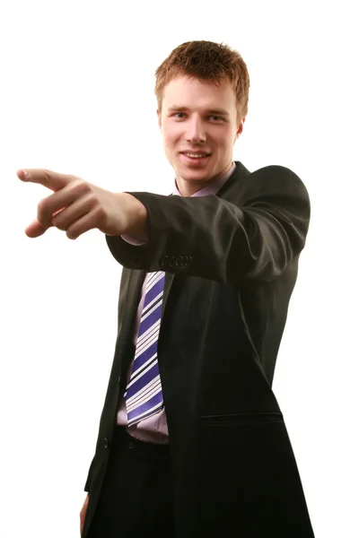 Młody biznesmen, wskazując palcem wskazującym — Zdjęcie stockowe