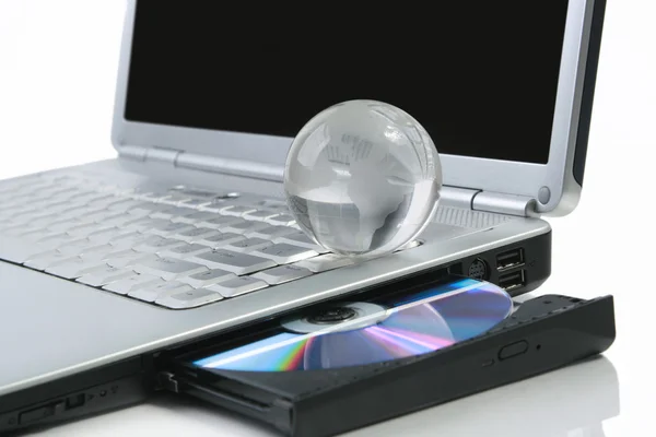 Glasses globe on laptop — Stock Photo, Image