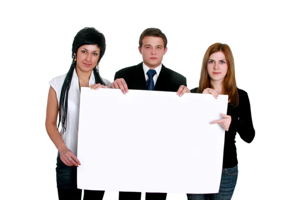 Uomini e donne d'affari con un grande cartello bianco — Foto Stock