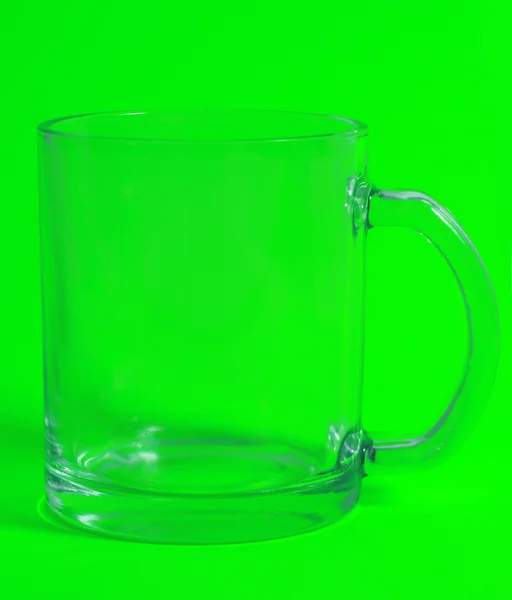Glass on green background — Stock Photo, Image