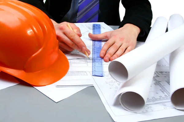 Architect working with technical drawings — Stock Photo, Image