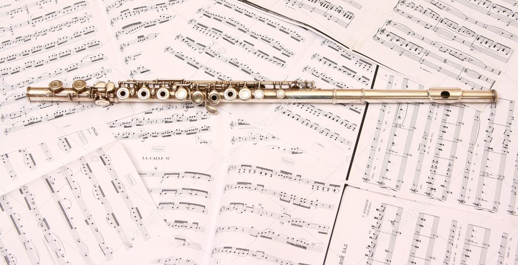A used flute rests across