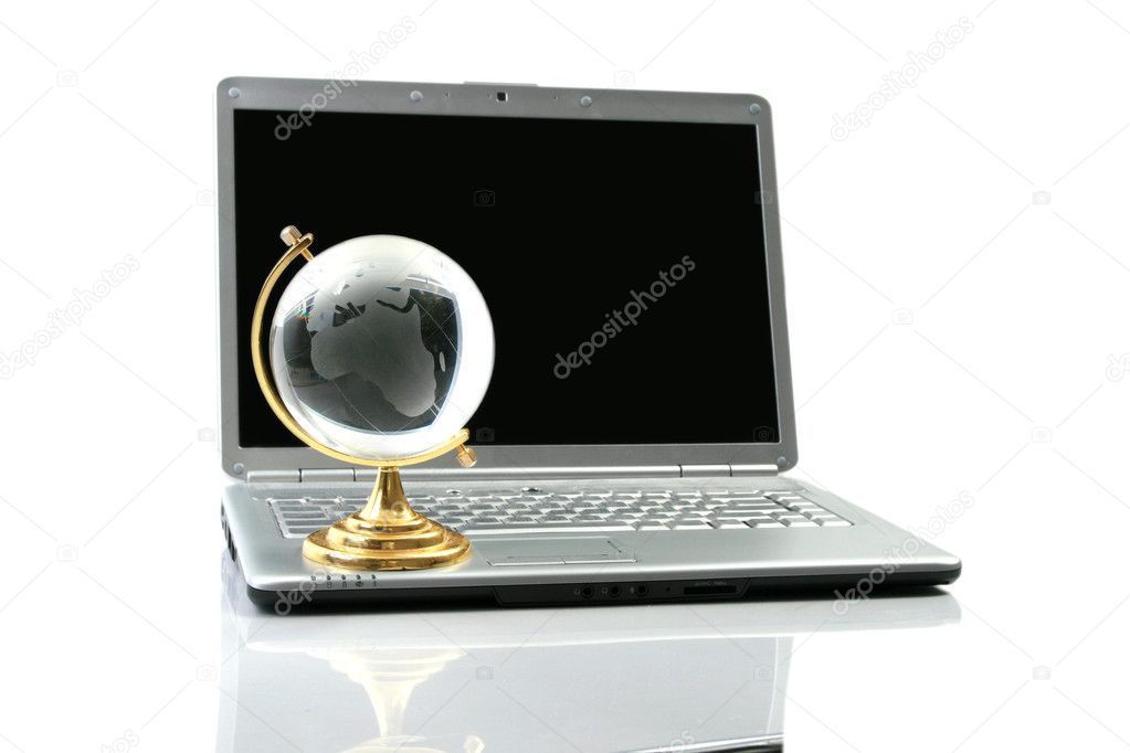 Glasses globe on laptop