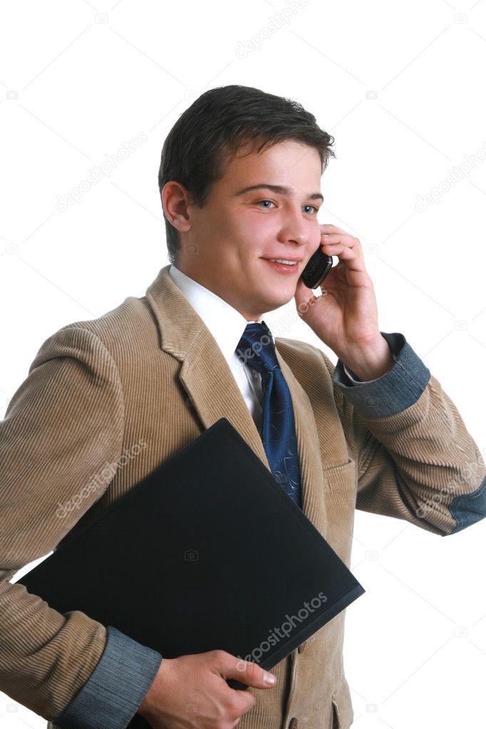 Happy business man laughing on his cell phone