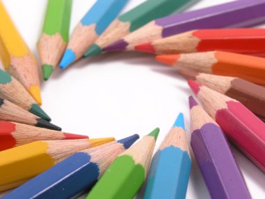Assortment of colored pencils with shado clipart