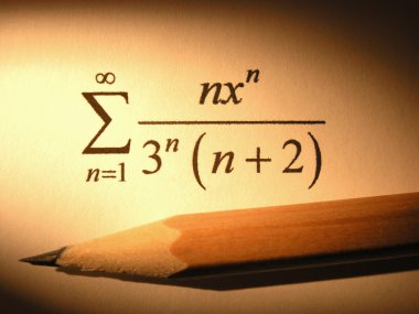 Closeup of an equation with a pencil clipart