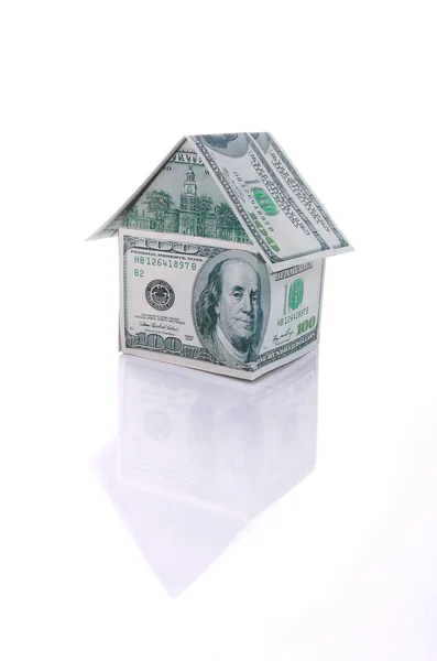 stock image The house of money isolated and reflecte