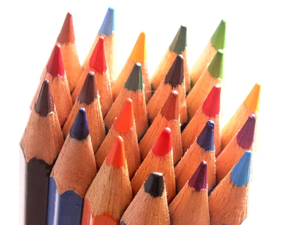 Lápices de colores afilados apuntando hacia arriba — Foto de Stock