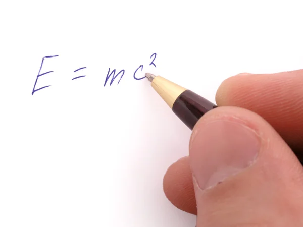 Bir kalem ile sayfa tutan bir el — Stok fotoğraf