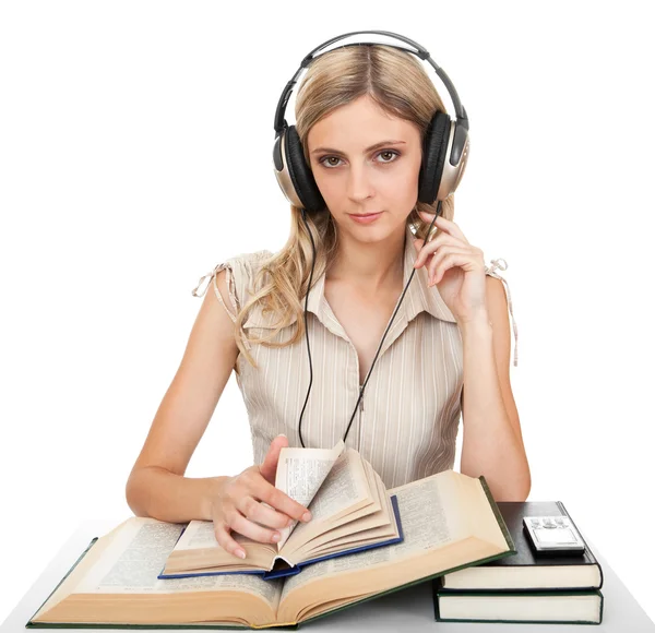 Estudante com livros e fones de ouvido . — Fotografia de Stock