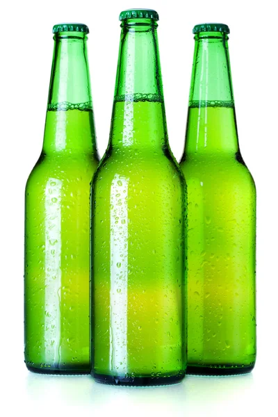 Три бутылки пива — стоковое фото