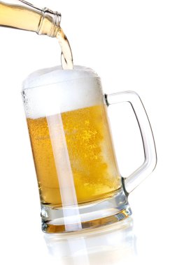 Beer is pouring into a glass from bottle clipart