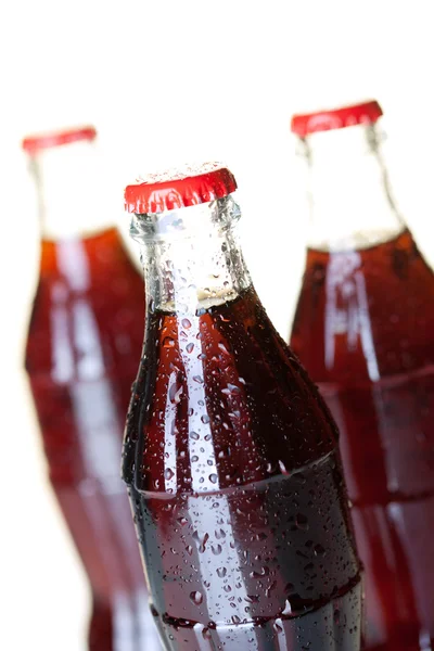 Three bottles of cold cola — Stock Photo, Image