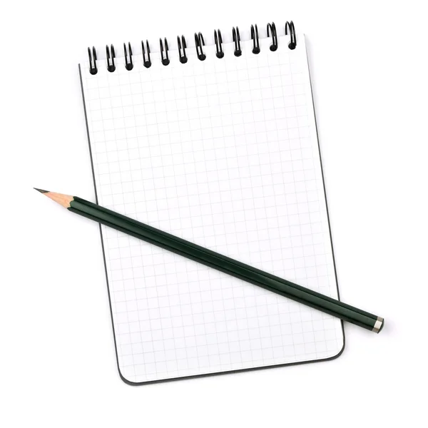 Schwarzer Bleistift auf Notizblock — Stockfoto