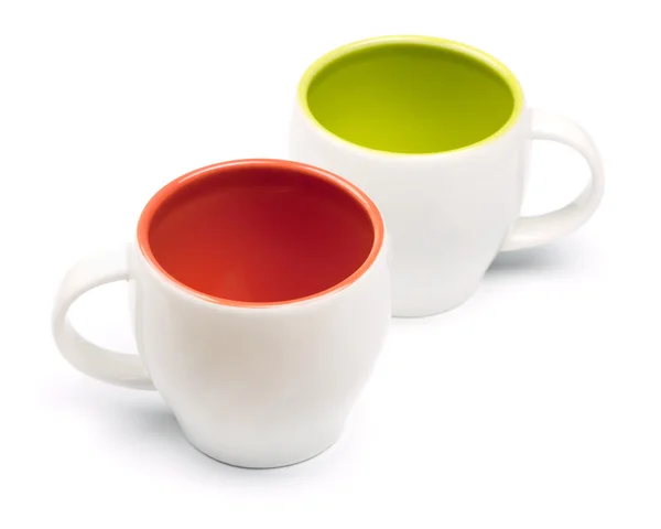 Twee lege kleur koffie kopjes — Stockfoto