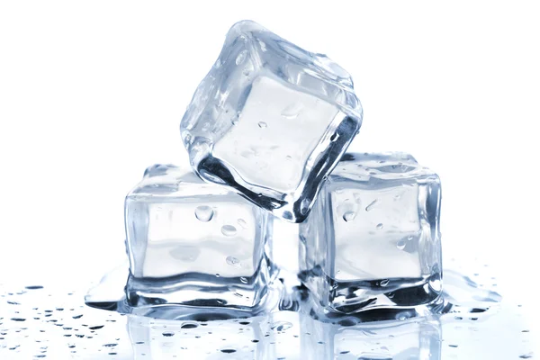 Drie smeltende ijsblokjes Rechtenvrije Stockfoto's