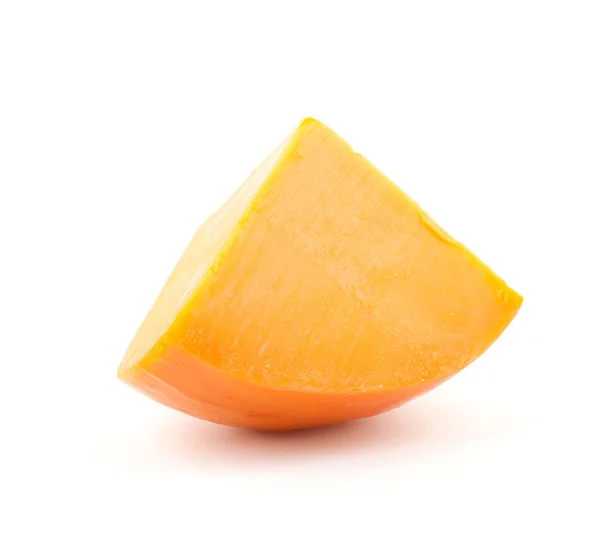Кусок апельсинового сыра — стоковое фото