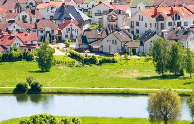 Nice private cottages beside the river clipart