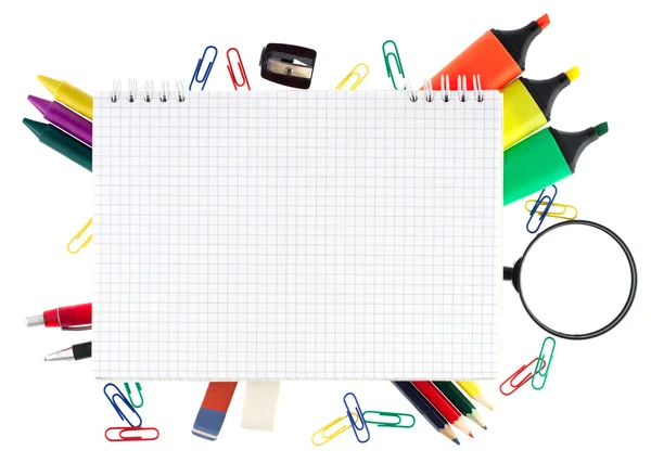Notepad with stationary objects on white background — Stock Photo, Image