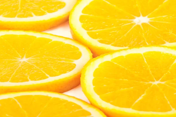 Rodajas de fondo naranja — Foto de Stock
