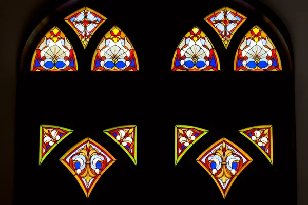 Stained glass window on black background — Stock Photo, Image