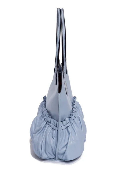 Beyaz arkaplanda mavi çanta — Stok fotoğraf