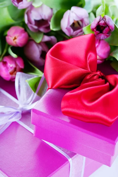 stock image Pink tulips and gift boxes