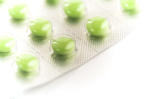 Close up of green pills — Stock Photo, Image