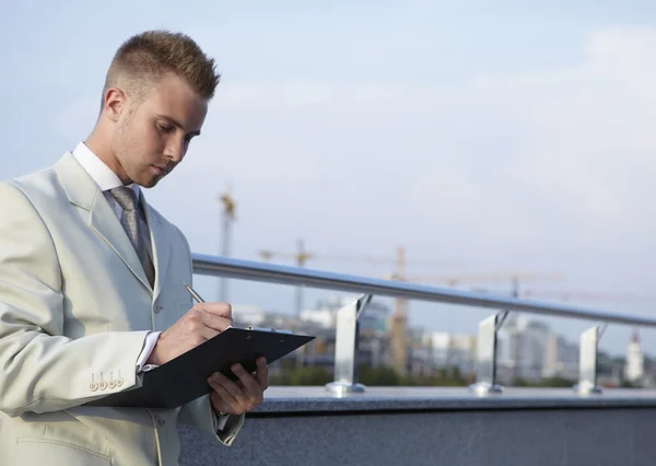 Young businessman working outdoor — Stock Photo, Image