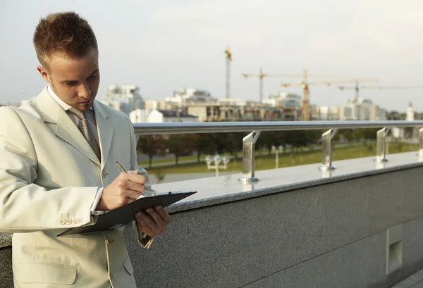 Young businessman working outdoor — Stock Photo, Image