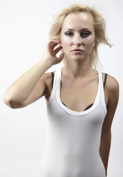Sexy Modell auf weißem Hintergrund. — Stockfoto