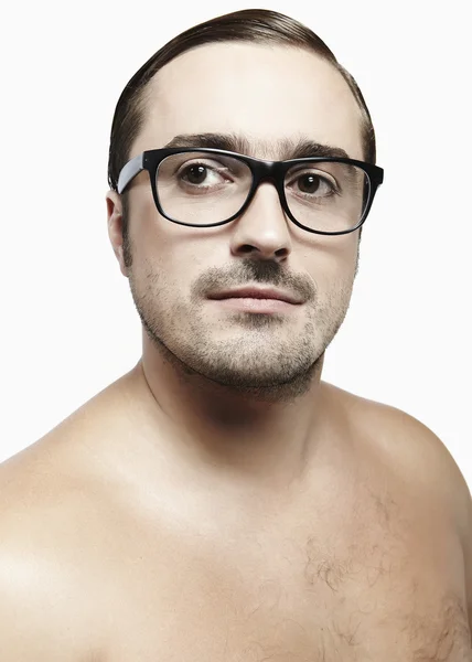 Handsome Middle ages man looking at camera with a pair of glasses — Stock Photo, Image