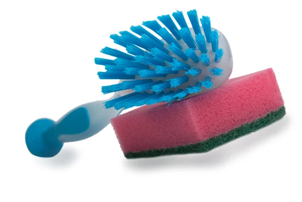 Brush for ware washing lies on sponge — Stock Photo, Image