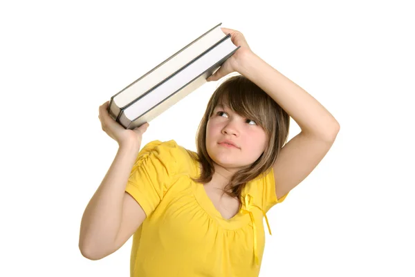 Meisje bedekt met boeken — Stockfoto