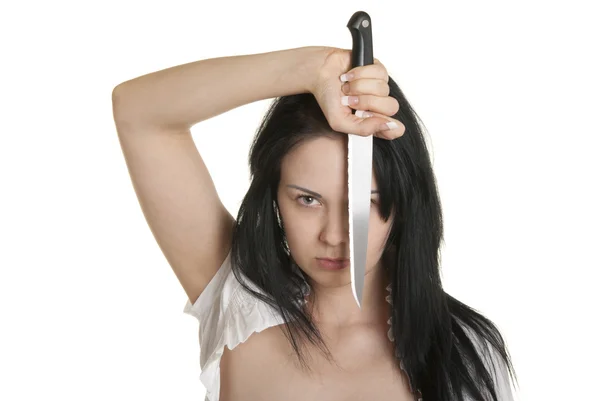 Jovem mulher segura faca na cara — Fotografia de Stock