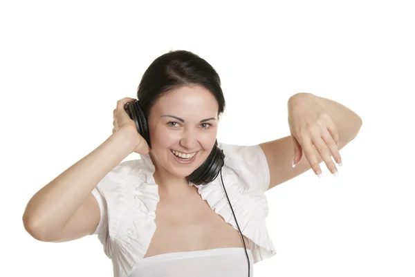 Joyeux jeune femme avec des écouteurs — Photo