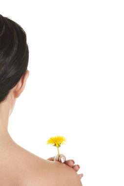 Woman holds ayellow flower clipart