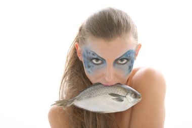 Woman in make-up with fish in mouth clipart