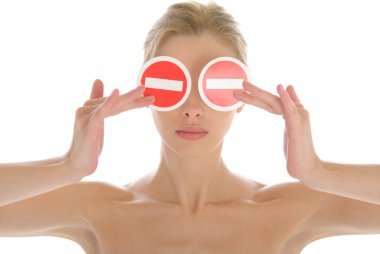 Woman holds two prohibiting signs before eyes clipart