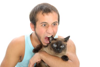 Man bites for ear of cat clipart