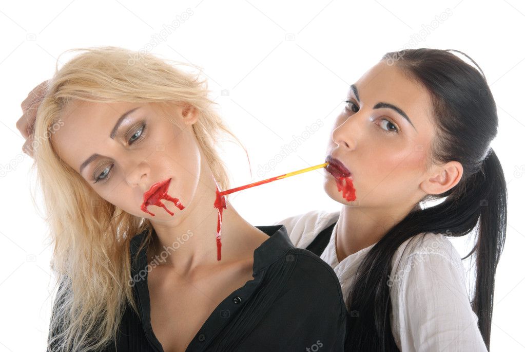 Woman sucks blood from neck of other woman