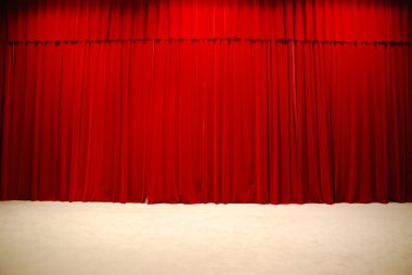 Red draped theater stage curtains clipart