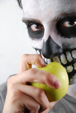 Don't eat just apples (skeleton guy concept) clipart