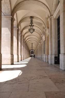 Commerce square arcades in Lisbon clipart