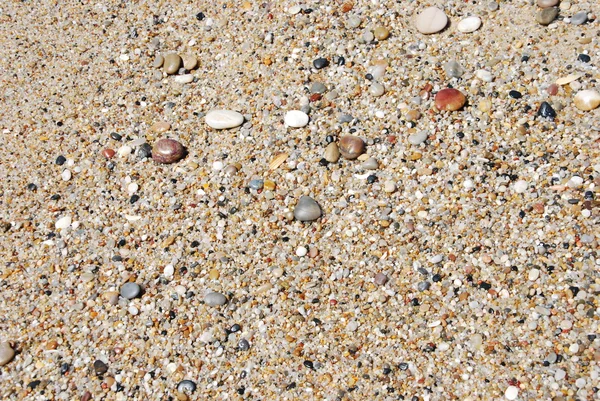 Fundo abstrato com pedras coloridas na praia — Fotografia de Stock