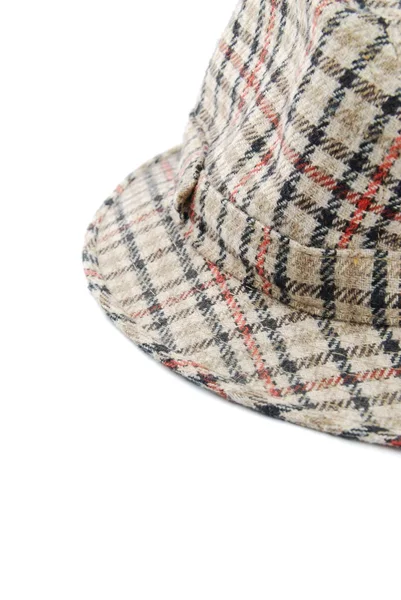 Zbliżenie: sprawdzone brązowy kapelusz na białym tle — Zdjęcie stockowe