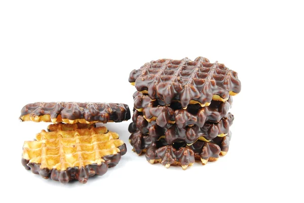 Waffles de chocolate empilhados em branco — Fotografia de Stock